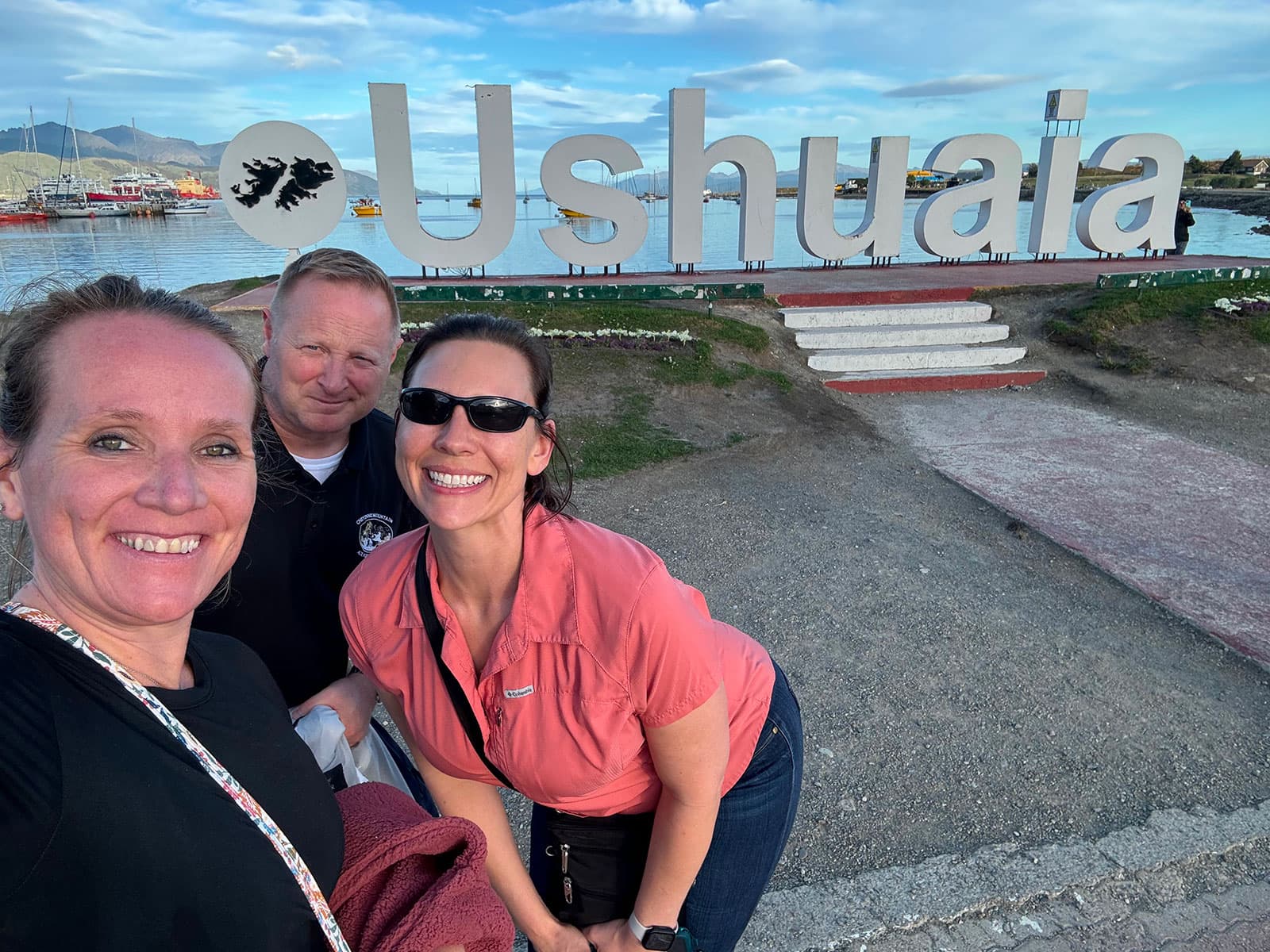 Jennifer, April, and Jeff at the Ushuaia sign