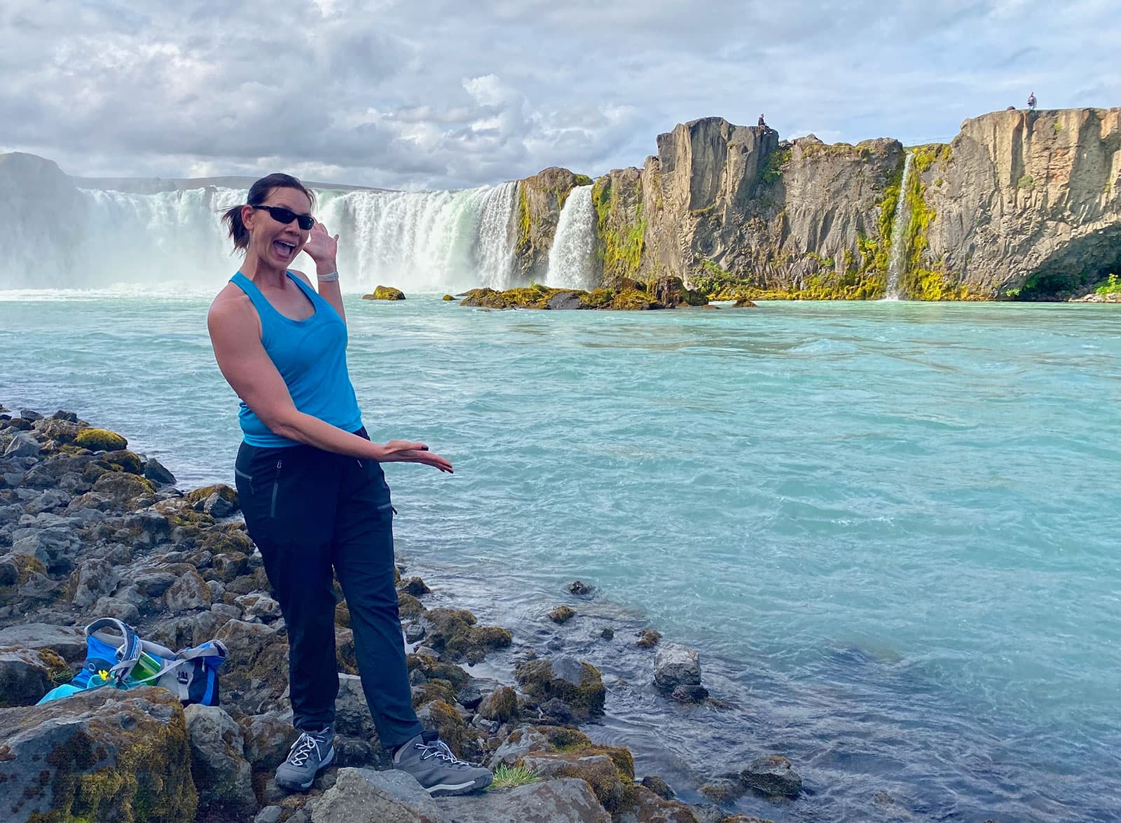 Jennifer standing beside Goðafoss waterfall