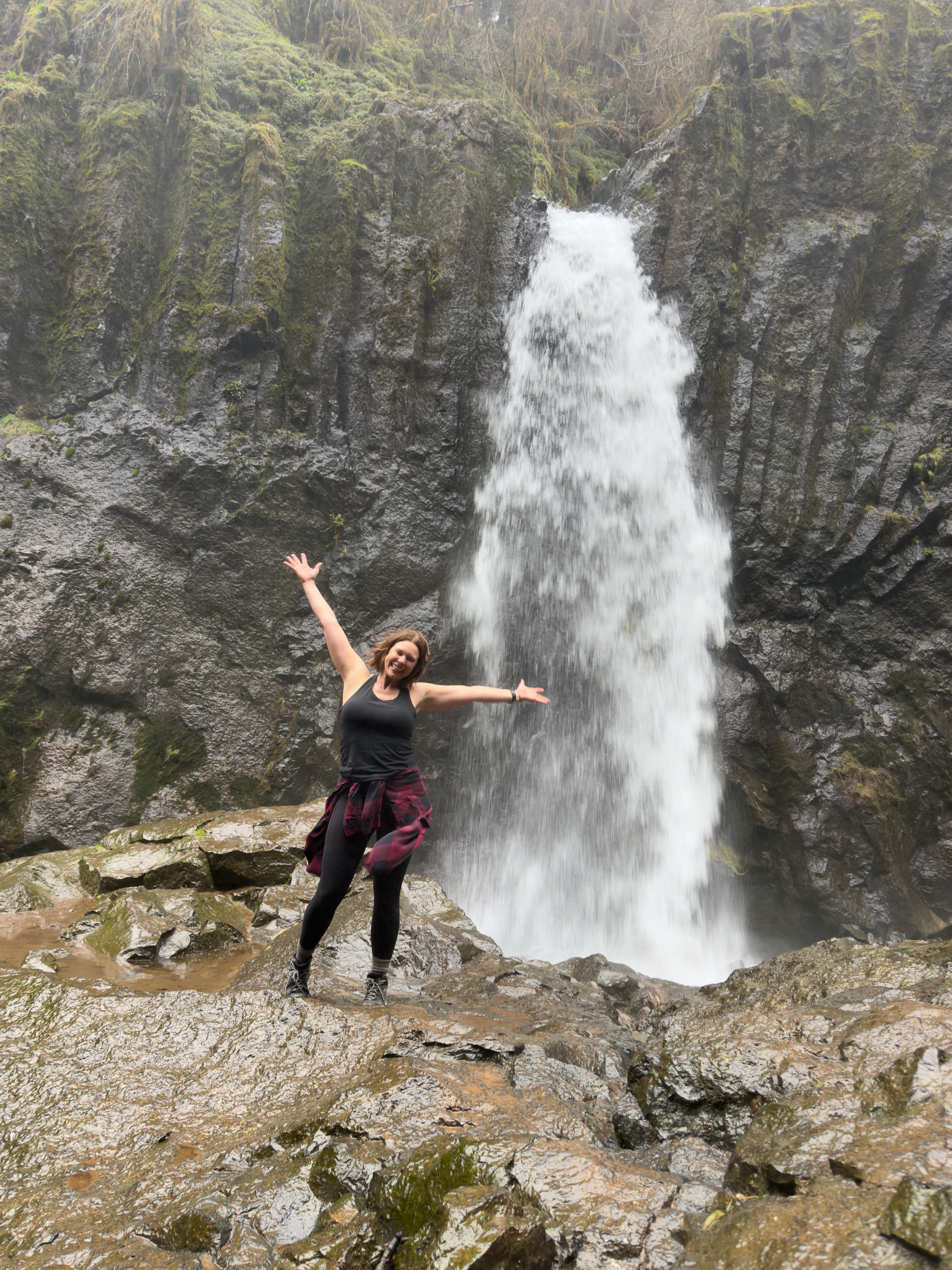 Jennifer visiting a waterfall